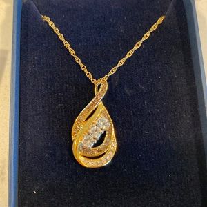 “Today, tomorrow & forever” diamond & topaz pendant.